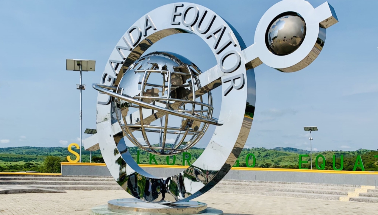 The Equator Landmark in Queen Elizabeth National Park: Visitors can experience an equator crossing in the park by placing one foot
